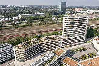 Aerial view of the NEO city quarter with roof terrace in Munich.