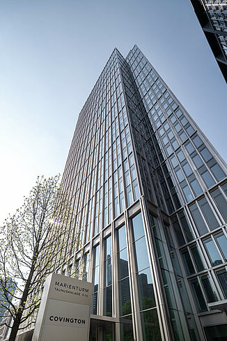 Glass façade of the Marienturm mixed-use tower block in Frankfurt.