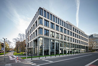 Side street view of the modern Carpathia office building in Warsaw's Powiślethia district.