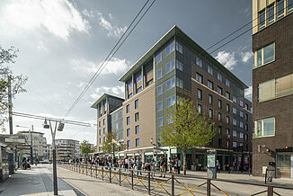 Tram stop in front of the Novotel Hotel in Paris.