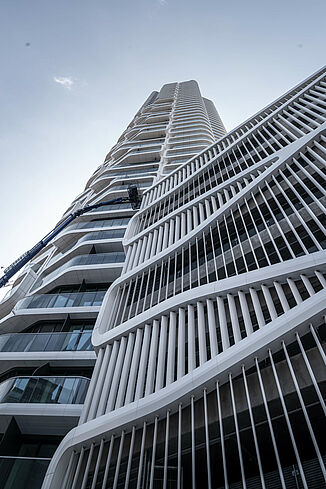 Detailed view of the façade with balconies of the Grand Tower in Frankfurt.