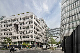 Street view of two building complexes of the Conseil Régional of the Île de France region in Paris.