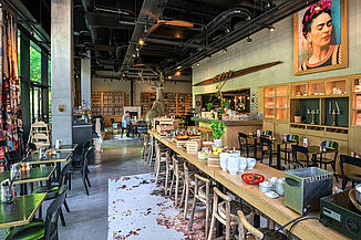 Interior view of the modern loft-style breakfast area of the MOB Hotel in Lyon.