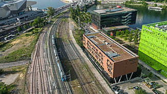 Aerial view of the MOB Hotel directly on the railway tracks in Lyon.